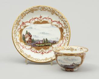 Teabowl and saucer with landscapes