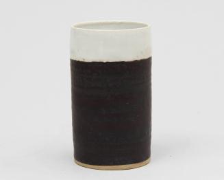 Manganese beaker with white band