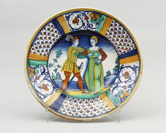 Dish with couple in a landscape