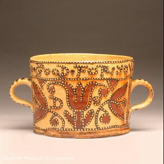 Two-handled cup with tulips