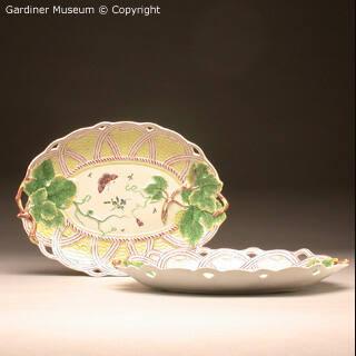 Pair of basket form serving dishes with grape leaves