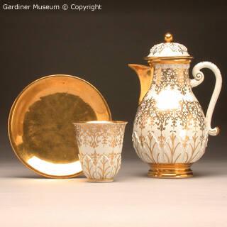 Coffee Pot and Pair of Beakers and Saucers