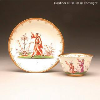 Teabowl and saucer with chinoiseries