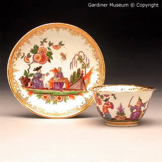 Teabowl and saucer painted by J.F.Metzsch (d. 1766)