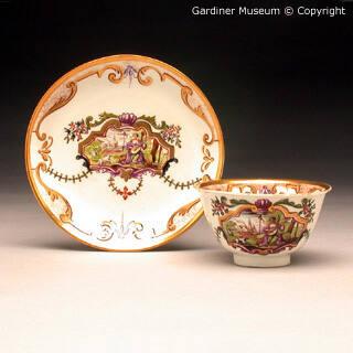 Teabowl and saucer painted by J.F.Metzsch (d. 1766)