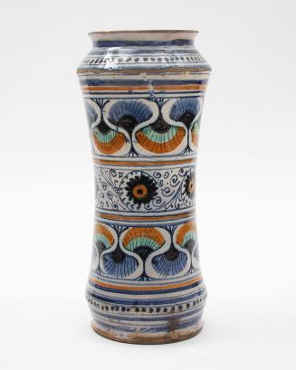 Albarello with peacock feathers