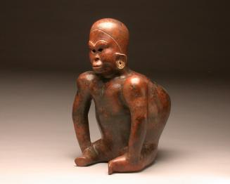 Figure of a seated person with spinal curvature