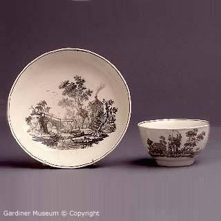 Teabowl and saucer with "The Bridge House" and "The Bird Coop" patterns