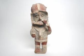 Male figure chewing coca