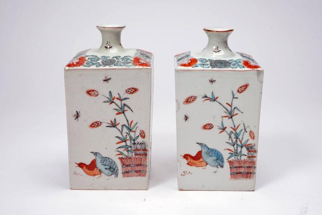 Pair of Kakiemon square bottles with banded hedge and quail design