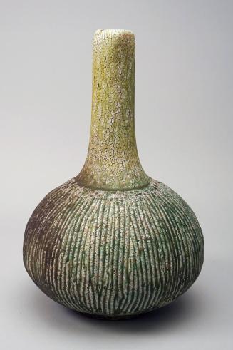 Large green vase with speckled glaze