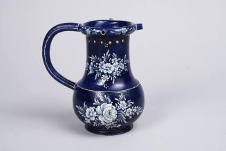 Puzzle Jug with Floral Decoration
