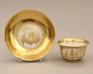 Teabowl and saucer with chinoiseries