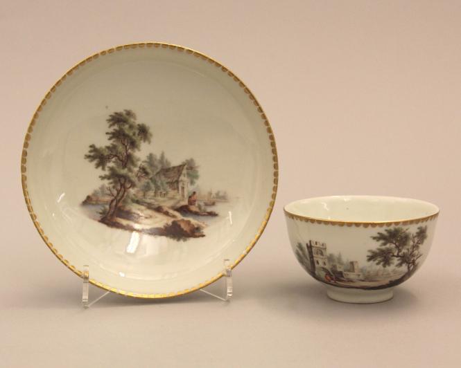 Teabowl and saucer with landscapes